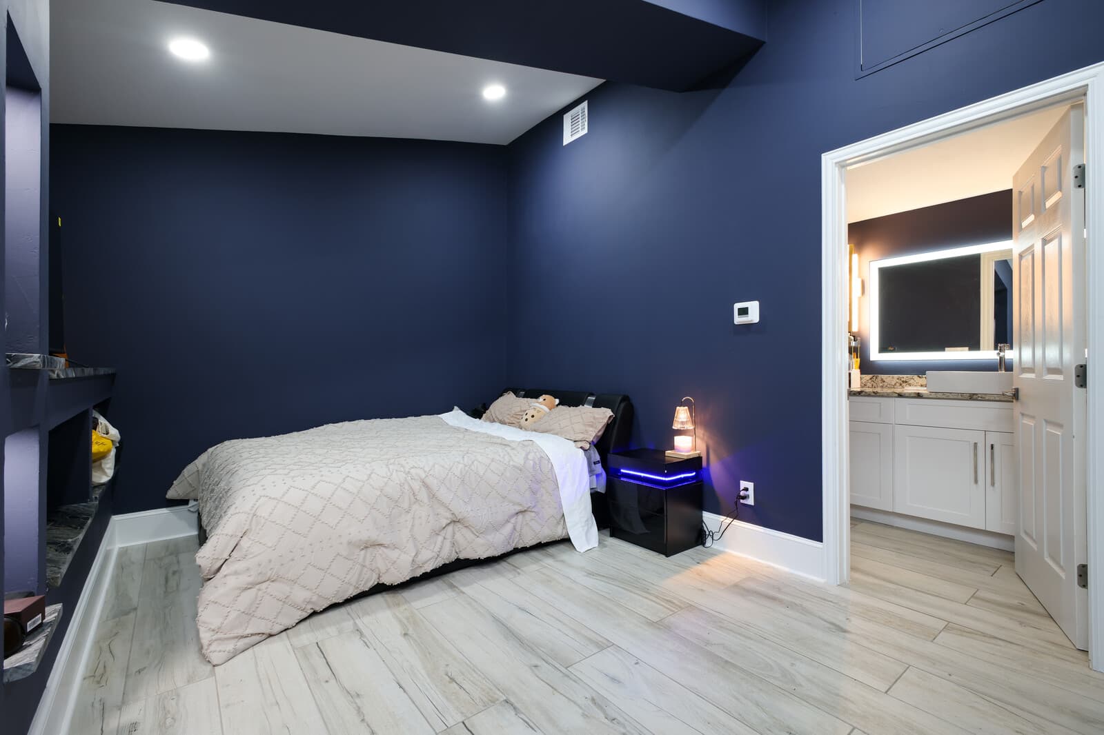 ADU sleeping area opening directly onto its own kitchen, San Antonio accessory dwelling unit